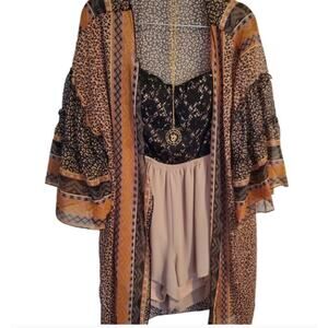 IRIS Los Angeles black lace and nude romper Open back sz. Med